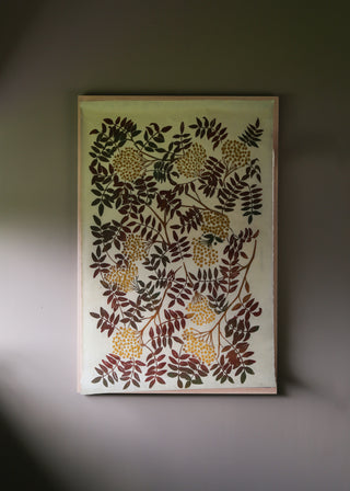 Rowan Print in Rust and Pale Yellow.